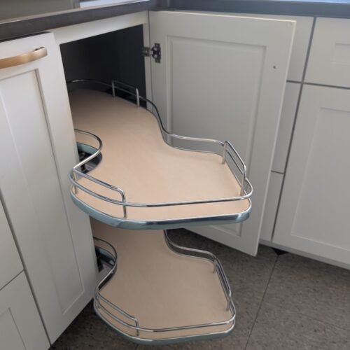 Make the most of your corner cabinets with our Pull-Out Corner Shelf. This innovative design maximizes access to the most difficult-to-reach spaces. The two-tier pull-out design allows you to store pots, pans, or other kitchen essentials in an organized manner, making them easy to reach when you need them. Built with sturdy metal rails and wooden shelves, this unit ensures long-lasting durability while maintaining a sleek and modern aesthetic in your kitchen.